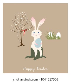Funny rabbits with easter eggs.