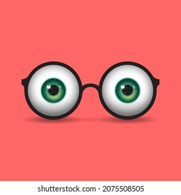 Funny round eyeglass frame and eyeballs with colored irises instead of lenses over bright background. Concept of vision correction using glasses, healthy vision