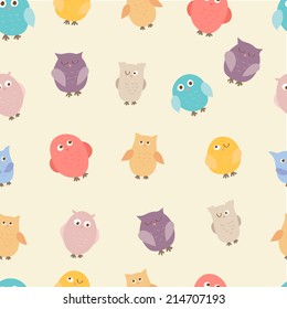 Funny seamless pattern. Cartoon color owls on light background. Ideal for textile, wallpaper, wrapping.