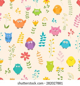 Funny seamless pattern. Cartoon color owls on light background. Ideal for textile, wallpaper, wrapping.