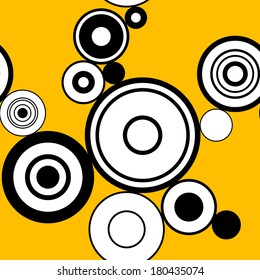 Funny seamless pattern with circles and yellow background