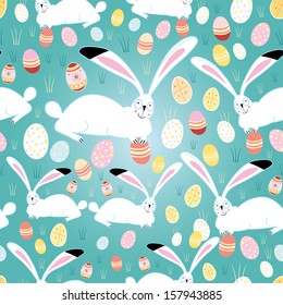 funny seamless pattern with Easter bunnies and eggs on a green background 