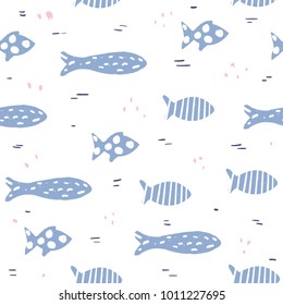 Funny seamless pattern with hand drawn swimming fishes. Vector illustration.