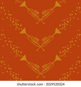 Funny seamless pattern with yellow trumpets on an orange background. Musical collection. 