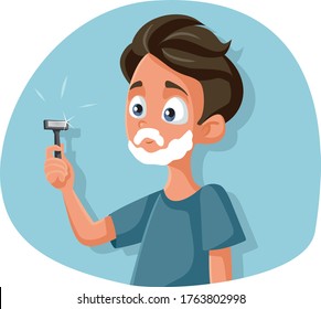 Funny Teenage Boy Shaving Holding Razor. Teenager thinking about shaving stepping into boyhood
