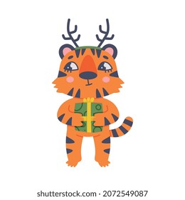 Funny Tiger Cub with Orange Fur and Stripes Wearing Deer Antler Holding Gift Box Vector Illustration