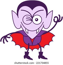 Funny vampire in minimalist style with pointy ears, sharp fangs and red cape while smiling, winking and making an OK sign with his hand