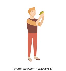 Funny young man or teenage boy holding tortoise or turtle. Adorable male cartoon character with domestic animal. Cute lovely reptile pet owner. Colorful vector illustration in flat cartoon style.