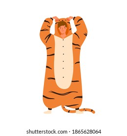 Funny Young Man Wearing Tiger Kigurumi For Pagama Party. Male Character Standing In Animal Costume. Cheerful Guy In Cozy Onesie. Flat Vector Cartoon Illustration Isolated On White Background