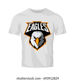 Furious eagle head athletic club vector logo concept isolated on white t-shirt mockup. Modern sport team mascot badge design. Premium quality wild bird emblem t-shirt tee print illustration.