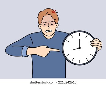 Furious man point at clock stressed with missed deadline. Mad male show with finger on watch distressed with bad time management. Vector illustration. 