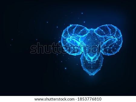 Futuristic Aries zodiac sign concept with glowing low polygonal ram or mouflonhead isolated on dark blue background. Modern wireframe mesh design vector illustration.