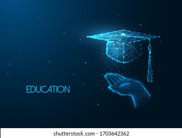 Futuristic education concept with glowing low polygonal human hand holding graduation cap isolated on dark blue background. Modern wire frame mesh design vector illustration.