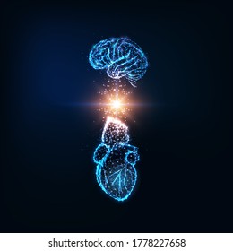 Futuristic emotional intelligence concept with glowing low polygonal human brain and heart and light energy between them isolated on dark blue background. Modern wire frame design vector illustration.