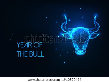 Futuristic glowing low polygonal bull, ox head. Taurus horoscope sign isolated on dark blue background. Modern wire frame mesh design vector illustration.