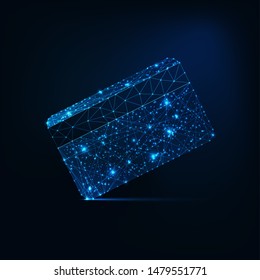 Futuristic glowing low polygonal credit card made of stars, lines, dots,triangles isolated on dark blue background. Online payment concept. Modern wireframe design vector illustration. 