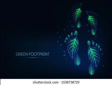 Futuristic glowing low polygonal green ecological footprints made of leaves on dark blue background. Environmentally friendly lifestyle concept. Modern wire frame mesh design vector illustration.