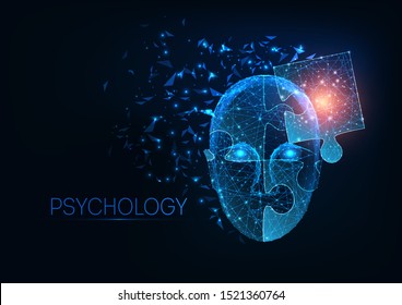 Futuristic glowing low polygonal human head made of jigsaw puzzle pieces isolated on dark blue background. Psychology, mental health concept. Modern wire frame mesh design vector illustration. 