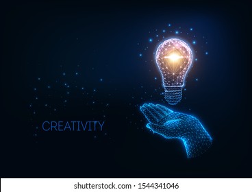 Futuristic glowing low polygonal light bulb and human hand isolated on dark blue background. Creativity, idea concept. Modern wire frame mesh design vector illustration.