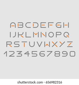 Futuristic grey and orange font on light background
