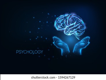 Futuristic psychology concept with glowing low polygonal hands holding human brain  isolated on dark blue background. Innovative idea, creativity. Modern wire frame mesh design vector illustration. 