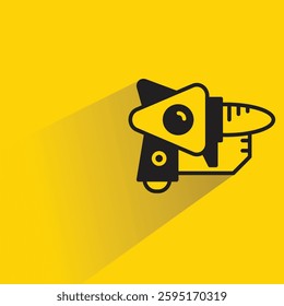 futuristic and space gun icon with shadow on yellow background