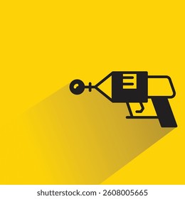 futuristic and space gun icon with shadow on yellow background