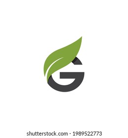 G Initial letter with green leaf