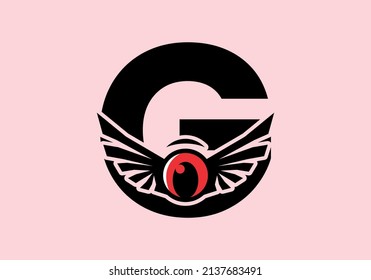 G initial letter with red eye wings design