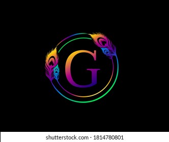 G Letter Decorated With Exotic Peacock Feather. Circle Badge With Peacock Feather. 