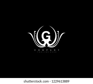 G letter linked monogram luxury rounded flourishes ornament logo