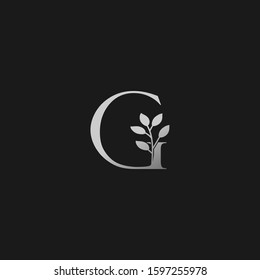 G Letter Logo Silver Classy Vintage  Nature Floral Branch Silhouettes Vector Design Initial Concept.
