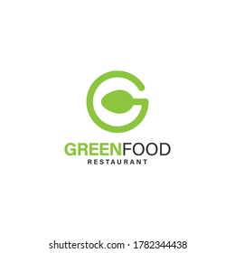 G Letra con cuchara y forma redonda o plato para el diseño del logo del restaurante de comida natural o fresca color verde vectorial