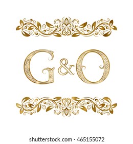 G and O vintage initials logo symbol. The letters are surrounded by ornamental elements. Wedding or business partners monogram in royal style.