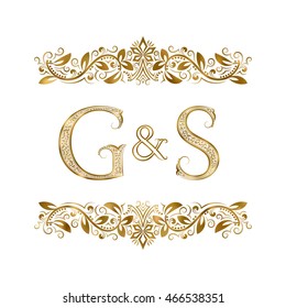 G and S vintage initials logo symbol. The letters are surrounded by ornamental elements. Wedding or business partners monogram in royal style.