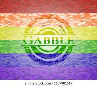 Gabble emblem on mosaic background with the colors of the LGBT flag