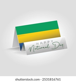 Gabon country paper flag standing on the ground. Happy national day flag design.