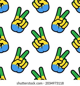 Gabon flag in the form of a peace sign. Seamless background. Gesture V victory sign, patriotic sign, icon for apps, websites, T-shirts, souvenirs, etc., isolated on white background