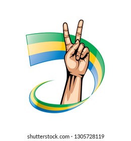 Gabon flag and hand on white background. Vector illustration