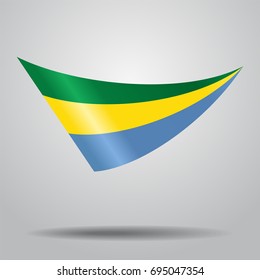 Gabon flag wavy abstract background. Vector illustration.