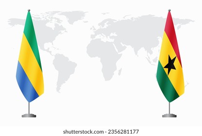 Gabon and Ghana flags for official meeting against background of world map.