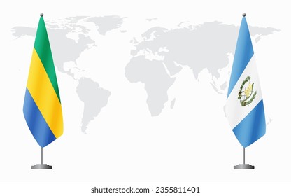 Gabon and Guatemala flags for official meeting against background of world map.