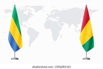Gabon and Guinea flags for official meeting against background of world map.