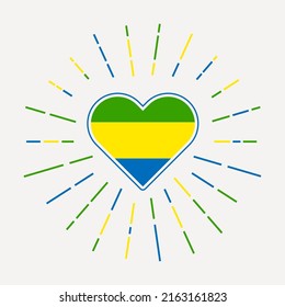 Gabon heart with flag of the country. Sunburst around Gabon heart sign. Vector illustration.