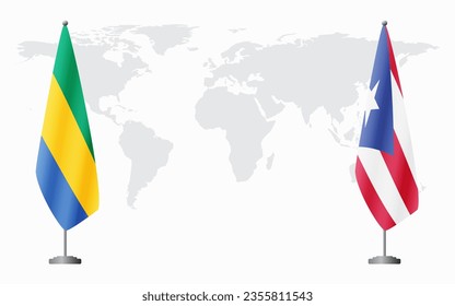 Gabon and Puerto Rico flags for official meeting against background of world map.