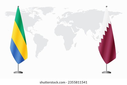 Gabon and Qatar flags for official meeting against background of world map.