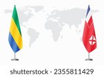 Gabon and Wallis and Futuna flags for official meeting against background of world map.