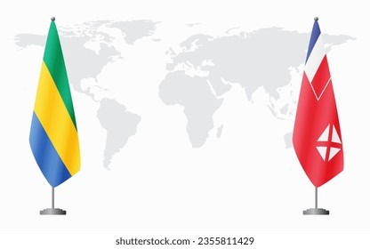 Gabon and Wallis and Futuna flags for official meeting against background of world map.