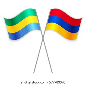 Gabonese and Armenian crossed flags. Gabon combined with Armenia isolated on white. Language learning, international business or travel concept.