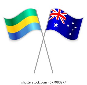 Gabonese and Australian crossed flags. Gabon combined with Australia isolated on white. Language learning, international business or travel concept.